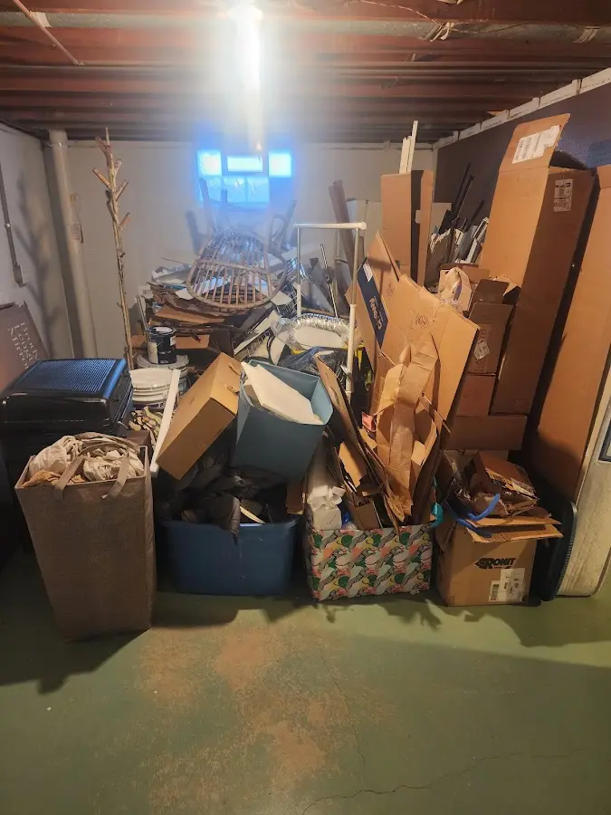 Roll-off dumpster container at job site for 2 Yard Dumpster Rental in Bonsall